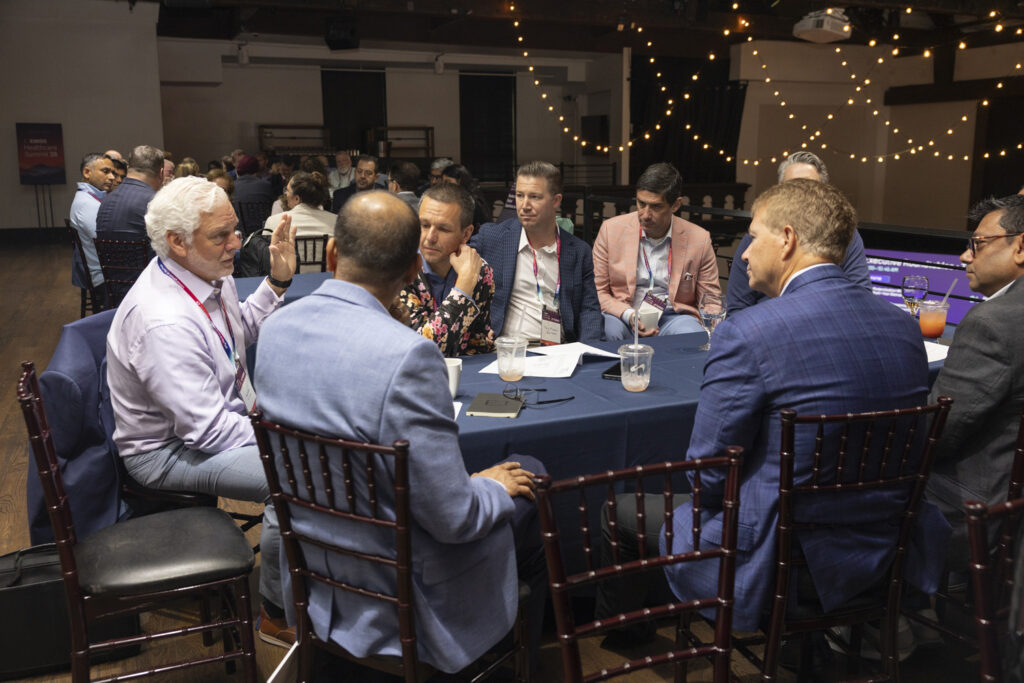 Leaders in conversation at a roundtable at the Emids Healthcare Summit